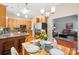 Well-designed kitchen with granite countertops, stainless steel appliances, and open view to the living room at 3032 Kilbeggan Dr, Lake Wylie, SC 29710