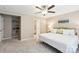 Comfortable main bedroom featuring a ceiling fan, closet with shelves, and ensuite bathroom at 3032 Kilbeggan Dr, Lake Wylie, SC 29710