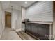 The bar features a stone countertop, dark cabinetry, and a white shiplap wall at 3243 Farmcrest Ct, Fort Mill, SC 29708