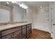 Bathroom featuring double sinks, granite countertops, and a walk-in shower at 3243 Farmcrest Ct, Fort Mill, SC 29708