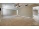 A spacious bedroom with neutral walls, carpet, recessed lighting, and a ceiling fan at 3243 Farmcrest Ct, Fort Mill, SC 29708