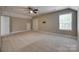 Large bedroom with ceiling fan, two closets, and a window offering great natural light at 3243 Farmcrest Ct, Fort Mill, SC 29708