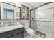 Modern bathroom with marble shower, black hardware, and framed art at 3585 Goodman Lake Rd, Salisbury, NC 28146