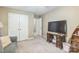 Functional bedroom featuring carpet floors and a large wall-mounted TV at 3585 Goodman Lake Rd, Salisbury, NC 28146