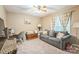 Well-lit bedroom featuring a comfortable couch, study space and plenty of room to relax at 3585 Goodman Lake Rd, Salisbury, NC 28146