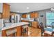 Spacious kitchen and dining area featuring an island with seating, quartz countertops and appliances at 3585 Goodman Lake Rd, Salisbury, NC 28146