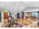 Spacious living room with hardwood floors, seamlessly connecting to the dining area and kitchen at 3585 Goodman Lake Rd, Salisbury, NC 28146