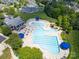 Aerial view of the community pool and clubhouse, surrounded by lush greenery at 3588 County Down Ave, Kannapolis, NC 28081