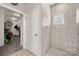 Bathroom with a shower, door and view into the closet at 3588 County Down Ave, Kannapolis, NC 28081