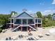 Exterior shot of the community clubhouse with a pool deck and outdoor seating at 3588 County Down Ave, Kannapolis, NC 28081