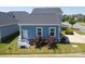 Rear exterior view of the house, showcasing the back entrance and yard area at 3588 County Down Ave, Kannapolis, NC 28081