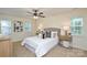 Comfortable bedroom with neutral walls, ceiling fan, and natural light at 3602 Brookstone Trl, Indian Trail, NC 28079