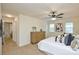 Bright bedroom featuring a ceiling fan, natural light, and neutral walls at 3602 Brookstone Trl, Indian Trail, NC 28079