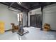 Spacious garage featuring durable epoxy flooring and convenient access doors for easy storage and workspace at 3602 Brookstone Trl, Indian Trail, NC 28079