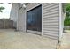 View of the garage exterior featuring a large door and concrete floor at 3602 Brookstone Trl, Indian Trail, NC 28079