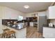 Modern kitchen features stainless steel appliances, granite counters, and a breakfast bar at 3602 Brookstone Trl, Indian Trail, NC 28079