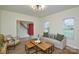 Inviting living room filled with natural light, featuring modern decor and neutral colors at 3602 Brookstone Trl, Indian Trail, NC 28079