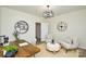 Comfortable office space with ample seating, a modern desk, and stylish decor at 3602 Brookstone Trl, Indian Trail, NC 28079