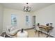 Well-lit office area featuring a wooden desk, neutral-toned walls, and cozy furnishings at 3602 Brookstone Trl, Indian Trail, NC 28079