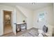 Bright room featuring stylish flooring, a cozy chair, and an access door at 3602 Brookstone Trl, Indian Trail, NC 28079