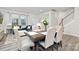 Open-concept space with a dining area, view of the living room, and natural lighting at 363 Cedar Knoll Cir, Pineville, NC 28134