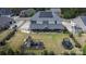 Aerial view of home showcasing fenced yard with patio, playground, and trampoline at 4071 Thames Cir, Fort Mill, SC 29715