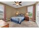 Cozy bedroom with natural light and stylish accents, creating a serene and inviting atmosphere for relaxation at 4071 Thames Cir, Fort Mill, SC 29715