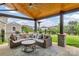Relax on the patio with seating area and backyard view, perfect for outdoor living at 4071 Thames Cir, Fort Mill, SC 29715