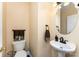 Bathroom with oval mirror, decorative light fixture, and modern fixtures at 4208 Carl Parmer Dr, Harrisburg, NC 28075