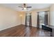Bedroom with wood floors, neutral walls, and large windows at 4208 Carl Parmer Dr, Harrisburg, NC 28075