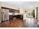 Stylish kitchen featuring stainless steel appliances, dark cabinetry, and an open layout at 4208 Carl Parmer Dr, Harrisburg, NC 28075