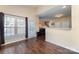 Bright living room with wood floors, white trim, and lots of natural light at 4208 Carl Parmer Dr, Harrisburg, NC 28075