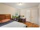 Functional bedroom with a desk setup, natural light, and a comfortable bed at 4623 Drifter Dr # 30, Charlotte, NC 28227