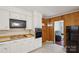 Cozy kitchen featuring white cabinets, wood accents, and a functional layout at 4623 Drifter Dr # 30, Charlotte, NC 28227