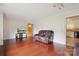 Comfortable living room featuring hardwood floors, a television, and cozy seating at 4623 Drifter Dr # 30, Charlotte, NC 28227
