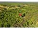 Aerial view of the property surrounded by dense forest, showcasing its secluded location at 4920 Morrison Houser Trl # 2, Lincolnton, NC 28092