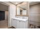 Bathroom features a dual sink vanity with marble countertop and walk in closet at 4920 Morrison Houser Trl # 2, Lincolnton, NC 28092
