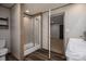 Bathroom with glass enclosed shower stall, toilet, and vanity with white marble counter at 4920 Morrison Houser Trl # 2, Lincolnton, NC 28092