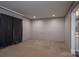 Bedroom with carpeted floors and blackout curtains that leads into the ensuite bathroom at 4920 Morrison Houser Trl # 2, Lincolnton, NC 28092
