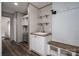 Functional mudroom area with built-in sink, shelving, and bench for convenient storage and organization at 4920 Morrison Houser Trl # 2, Lincolnton, NC 28092