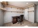 Cozy home office with classic desk, chair, and built-in shelving for ample storage and organization at 4920 Morrison Houser Trl # 2, Lincolnton, NC 28092