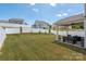 Expansive backyard offers plenty of space, privacy fencing, and an inviting covered patio at 507 Newfound Hollow Dr, Charlotte, NC 28214