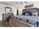 The spacious bedroom boasts a stylish dresser, a ceiling fan, and tasteful decor at 507 Newfound Hollow Dr, Charlotte, NC 28214