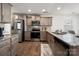 Modern kitchen with stainless steel appliances and granite countertops at 507 Newfound Hollow Dr, Charlotte, NC 28214
