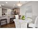 Charming eat-in kitchen features stainless appliances, granite countertops, and a cozy dining area at 507 Newfound Hollow Dr, Charlotte, NC 28214