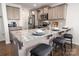 Stylish kitchen with granite countertops, stainless steel appliances, and a breakfast bar with seating at 507 Newfound Hollow Dr, Charlotte, NC 28214