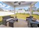 Relaxing covered patio with a view of the spacious, well-maintained, fenced backyard at 507 Newfound Hollow Dr, Charlotte, NC 28214