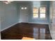 Inviting living room featuring gleaming hardwood floors and natural light at 523 Franklin Ave, Charlotte, NC 28206