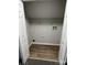 An empty closet with wooden floors at 5637 Hedgecrest Pl, Charlotte, NC 28269