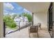 Charming balcony space with comfortable seating and a clear view of the lush surroundings at 614 Queens Rd, Charlotte, NC 28207